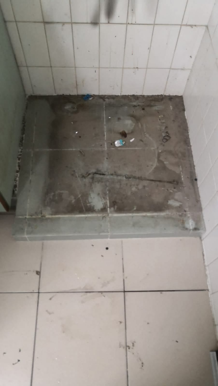 Laundry area before cleaning